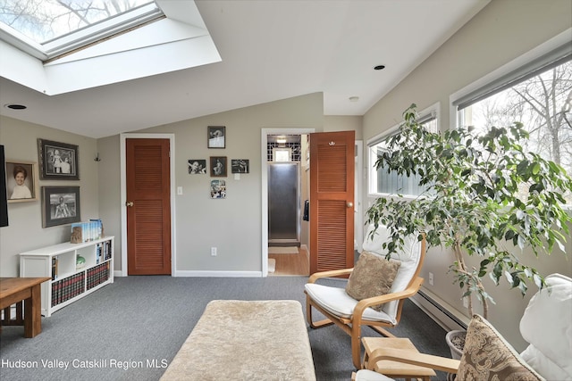 33 Cottonwood Ln, Woodstock, NY 12498 - sitting room featuring a skylight, baseboard heating, vaulted ceiling, and carpet floors
