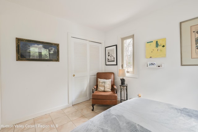 33 Cottonwood Ln, Woodstock, NY 12498 - bedroom featuring light tile patterned floors and a closet