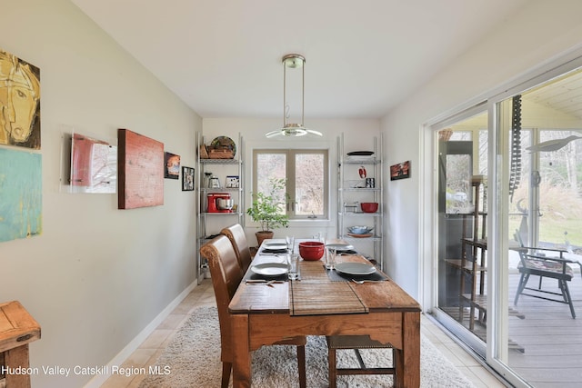 33 Cottonwood Ln, Woodstock, NY 12498 - dining space with light tile patterned floors