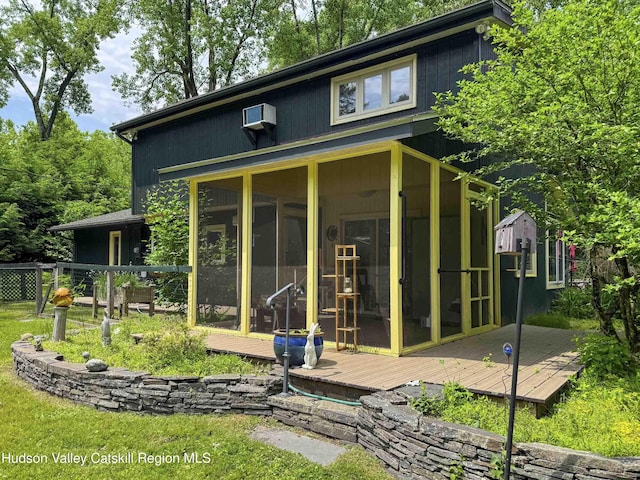 33 Cottonwood Ln, Woodstock, NY 12498 - back of house featuring a sunroom and a wooden deck