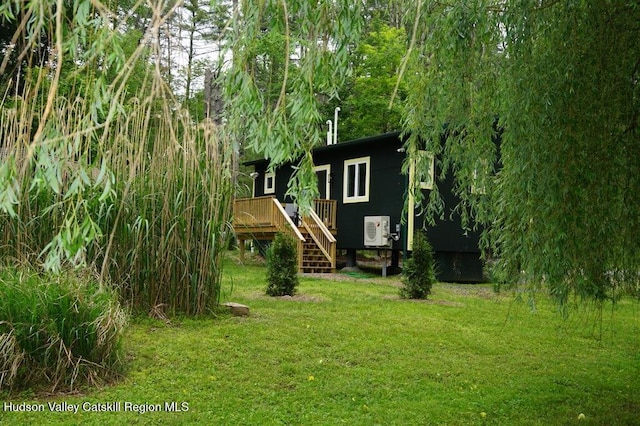 33 Cottonwood Ln, Woodstock, NY 12498 - view of grassy yard featuring a wooden deck and stairway