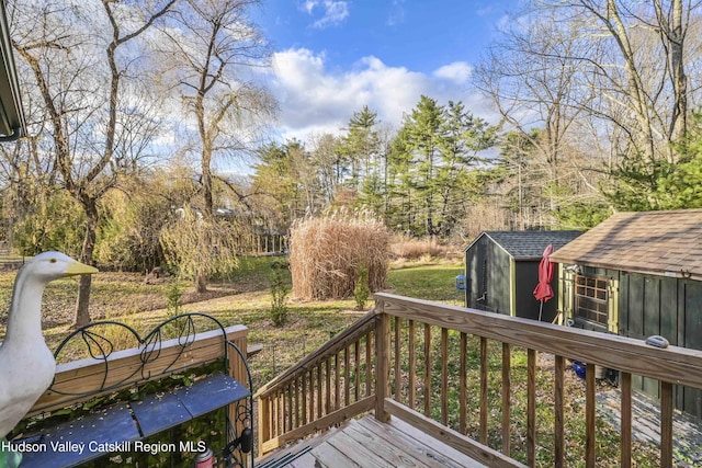 33 Cottonwood Ln, Woodstock, NY 12498 - wooden terrace with a shed and view of scattered trees
