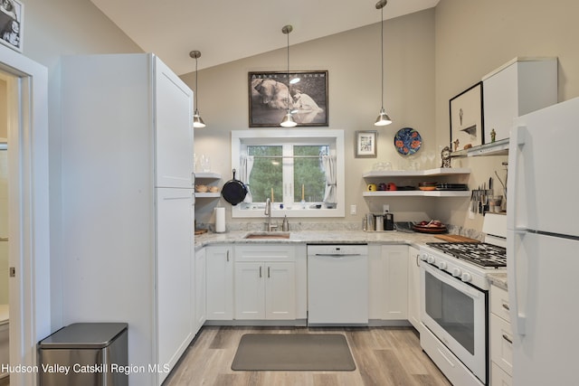 33 Cottonwood Ln, Woodstock, NY 12498 - kitchen featuring white appliances, light wood finished floors, light stone counters, white cabinetry, and open shelves