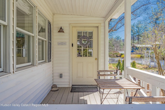 entrance to property with a porch