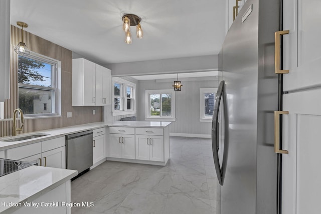 345 Lucas Ave, Kingston, NY 12401 - kitchen with stainless steel appliances, a sink, light marble finish floors, and white cabinetry