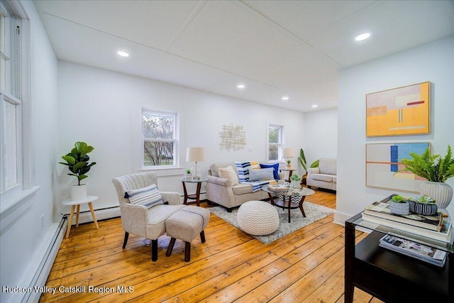 1792 State Route 213, Ulster Park, NY 12487 - living room with light wood-type flooring, baseboard heating, recessed lighting, and a baseboard radiator