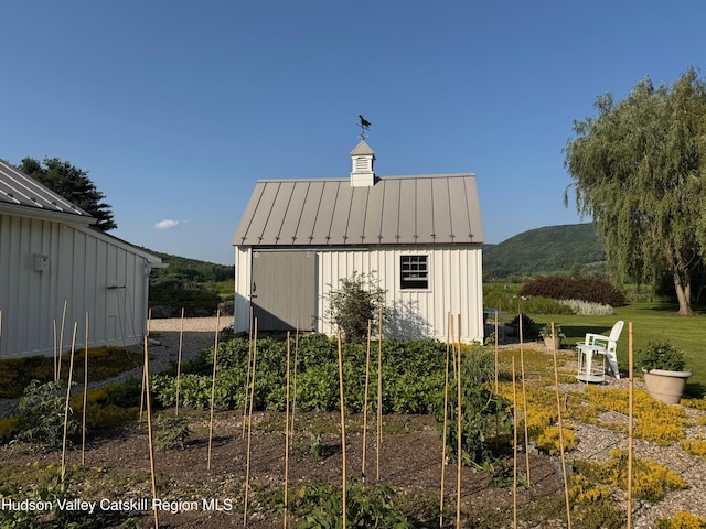 110 County Route 7a, Copake, NY 12516 - view of outdoor structure featuring a vegetable garden and a mountain view