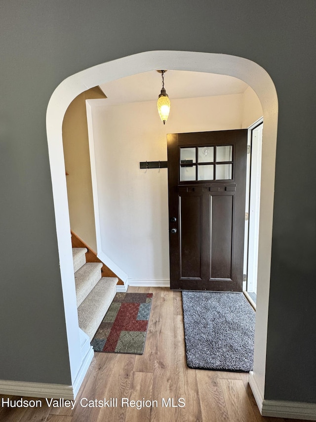 foyer with light wood-type flooring