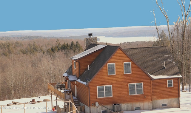 view of property exterior with central air condition unit