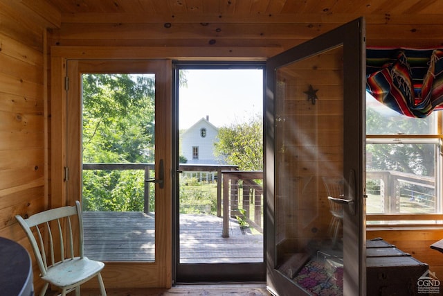 44 Worth Ave, Hudson, NY 12534 - doorway to outside featuring wooden ceiling and wood walls