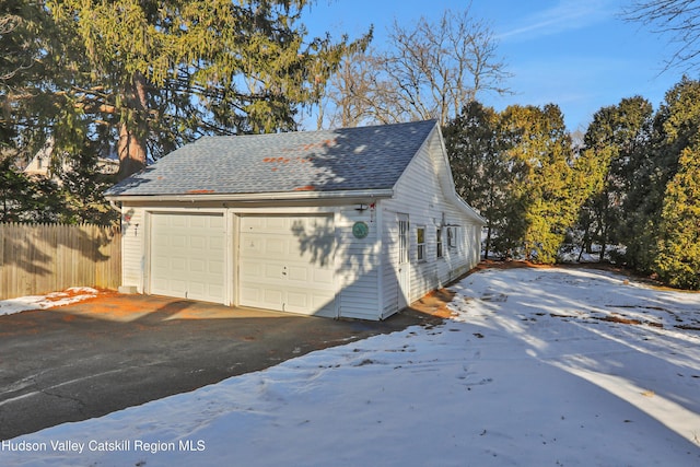 view of snow covered garage