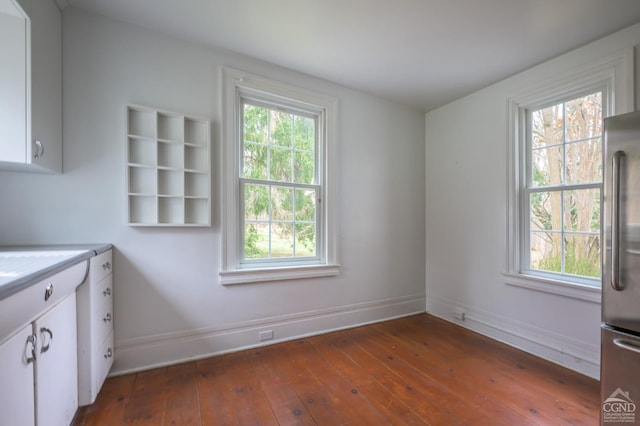 1606 Bulls Head Rd, Stanfordville, NY 12581 - kitchen featuring high end refrigerator, plenty of natural light, and white cabinets