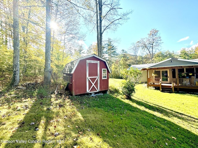 view of outdoor structure with a lawn