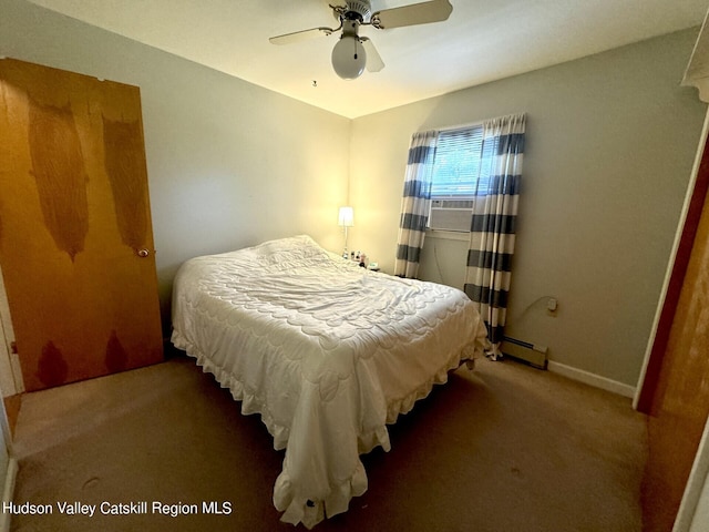 bedroom with cooling unit, ceiling fan, carpet floors, and a baseboard heating unit