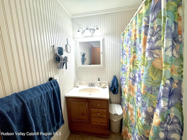 bathroom with vanity and crown molding