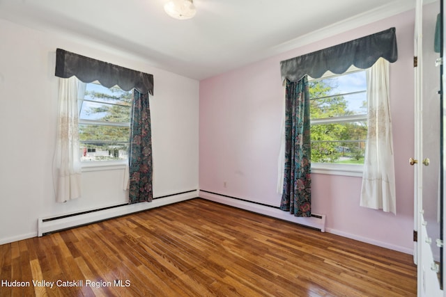 4 Schuler Ln, Lake Katrine, NY 12449 - unfurnished room with wood finished floors and a baseboard radiator