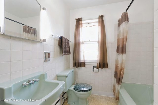 4 Schuler Ln, Lake Katrine, NY 12449 - full bath with tile walls, toilet, shower / bath combination with curtain, a sink, and tile patterned flooring