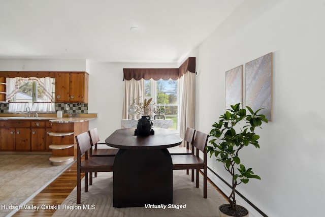 4 Schuler Ln, Lake Katrine, NY 12449 - dining space featuring healthy amount of natural light and light wood-style flooring