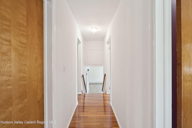 4 Schuler Ln, Lake Katrine, NY 12449 - corridor with wood finished floors, an upstairs landing, and baseboards