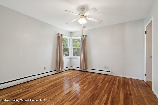4 Schuler Ln, Lake Katrine, NY 12449 - unfurnished room with wood finished floors, a ceiling fan, and a baseboard radiator