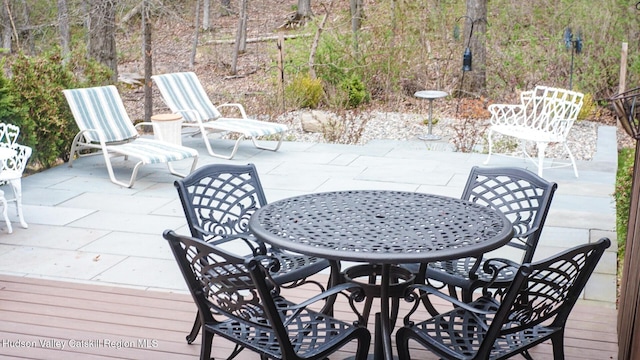exterior space featuring outdoor dining space and a patio area