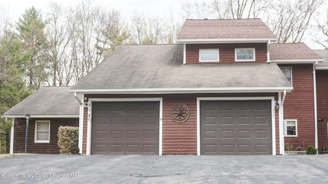 garage with driveway