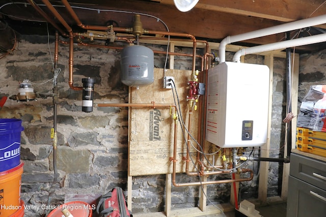 utility room with water heater