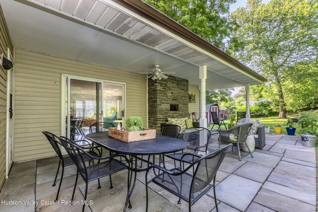 331 Joys Ln, Hurley, NY 12443 - view of patio / terrace with a ceiling fan, outdoor dining space, and a storage unit