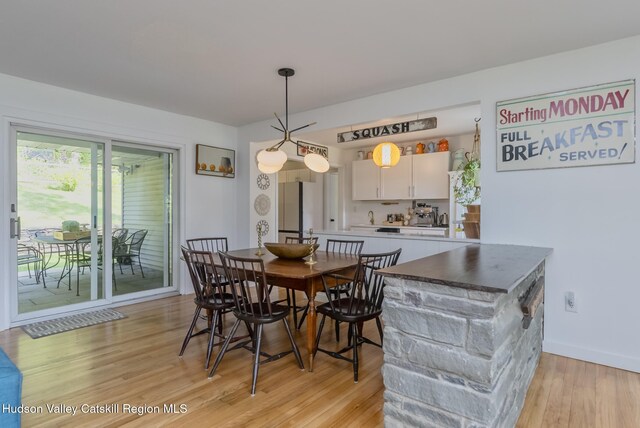 331 Joys Ln, Hurley, NY 12443 - dining space featuring light wood-style floors and baseboards
