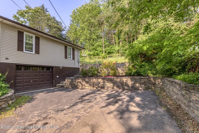 331 Joys Ln, Hurley, NY 12443 - view of property exterior with driveway and an attached garage