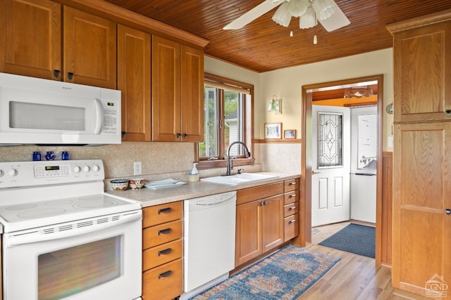 470 W Main St, Catskill, NY 12414 - kitchen featuring white appliances, a sink, wood ceiling, light wood-style flooring, and light countertops