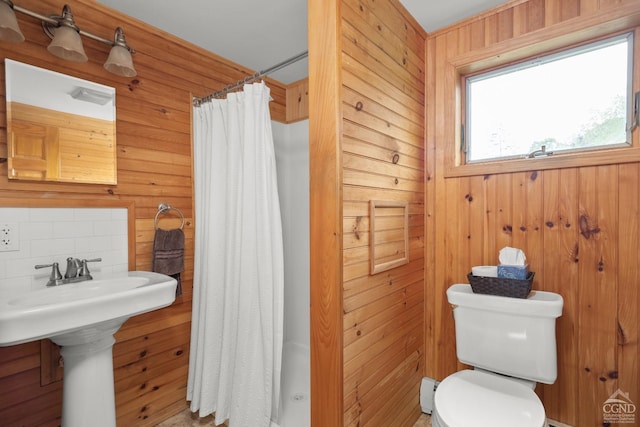 470 W Main St, Catskill, NY 12414 - bathroom with a shower with curtain, tasteful backsplash, wood walls, and toilet