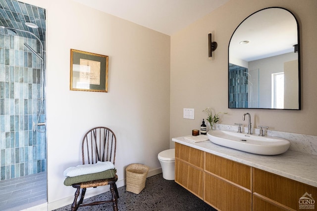 998 Willow Brook Rd, Milan, NY 12514 - full bathroom featuring tiled shower, baseboards, vanity, and speckle patterned floor