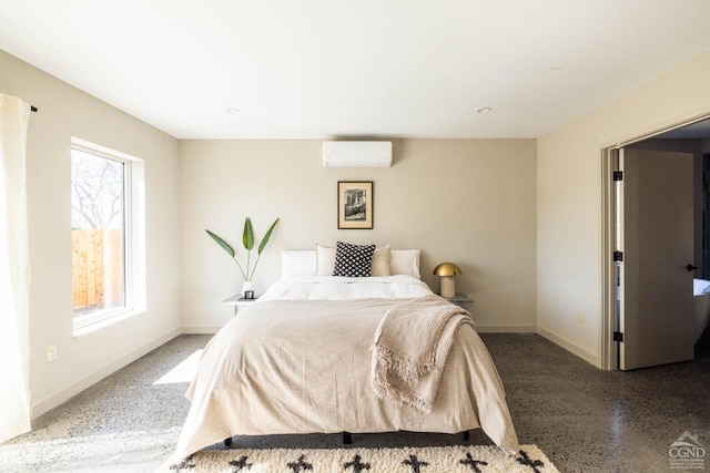 998 Willow Brook Rd, Milan, NY 12514 - bedroom featuring an AC wall unit, multiple windows, baseboards, and speckle patterned floor