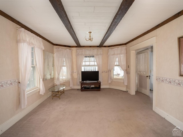 16 Oakwood Blvd, Hudson, NY 12534 - entrance foyer with baseboards, beamed ceiling, and light colored carpet