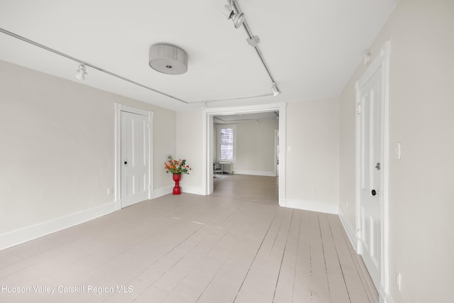 356 Warren St, Hudson, NY 12534 - unfurnished room with rail lighting