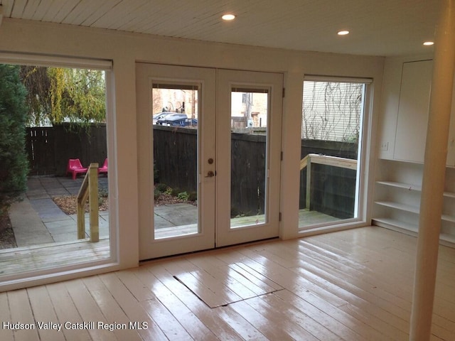 356 Warren St, Hudson, NY 12534 - doorway with french doors, hardwood / wood-style flooring, and recessed lighting