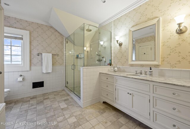 147 Moadock Rd, Millerton, NY 12546 - bathroom with vanity, tile walls, ornamental molding, a stall shower, and a wainscoted wall