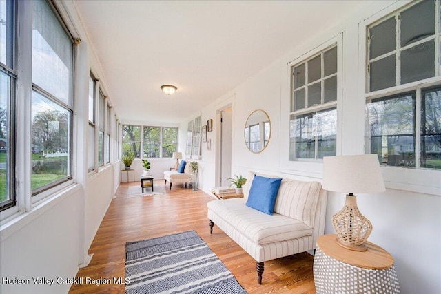 sunroom / solarium with wood finished floors