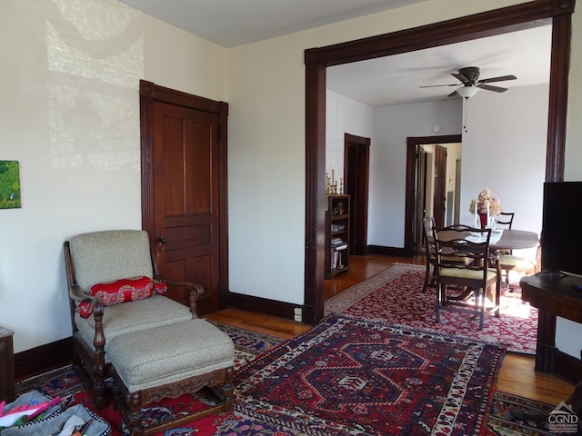 32-34 8th St, Hudson, NY 12534 - living area featuring wood finished floors, ceiling fan, and baseboards