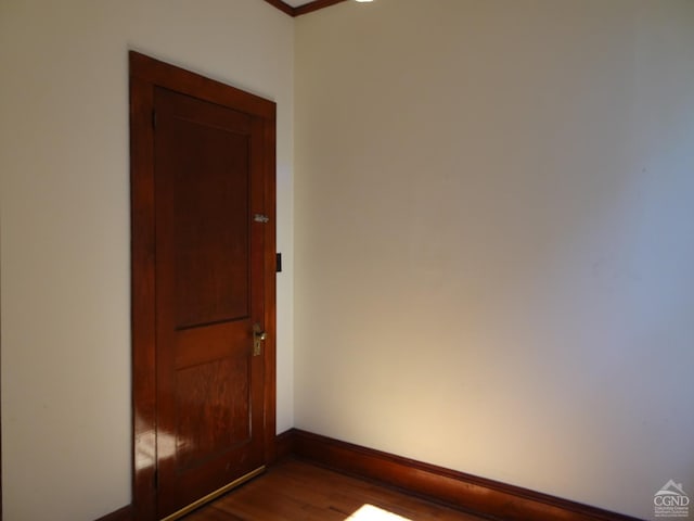 32-34 8th St, Hudson, NY 12534 - unfurnished room featuring dark wood finished floors, baseboards, and crown molding