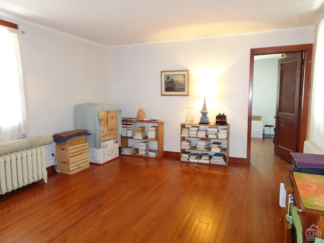 32-34 8th St, Hudson, NY 12534 - miscellaneous room featuring radiator heating unit, hardwood / wood-style floors, ornamental molding, and baseboards