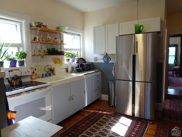 32-34 8th St, Hudson, NY 12534 - kitchen featuring freestanding refrigerator, white electric stove, wood finished floors, a sink, and light countertops