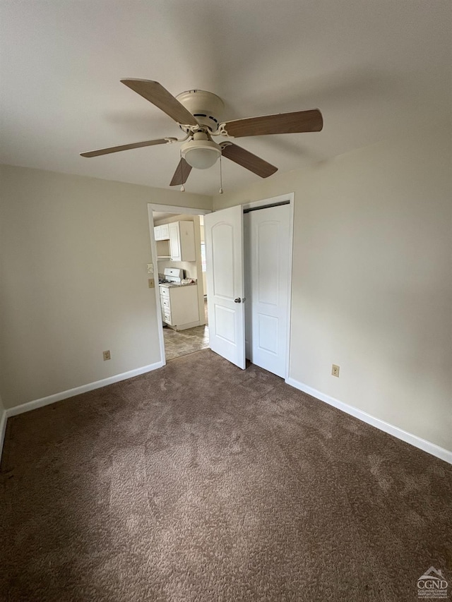 1013 Plank Rd, Averill Park, NY 12018 - unfurnished bedroom featuring baseboards, carpet, a closet, and a ceiling fan