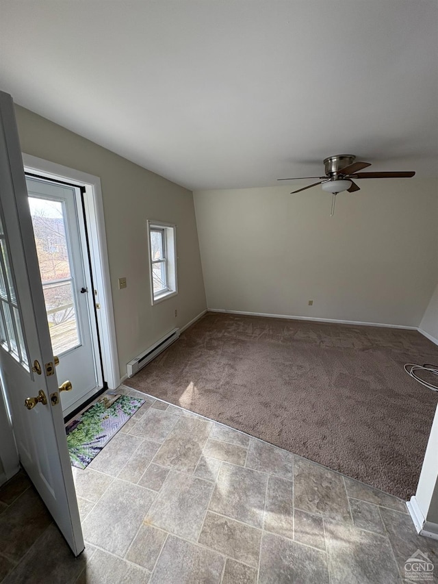1013 Plank Rd, Averill Park, NY 12018 - foyer featuring baseboard heating, carpet, baseboards, and ceiling fan