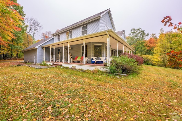 1013 Plank Rd, Averill Park, NY 12018 - rear view of property with a lawn and a porch