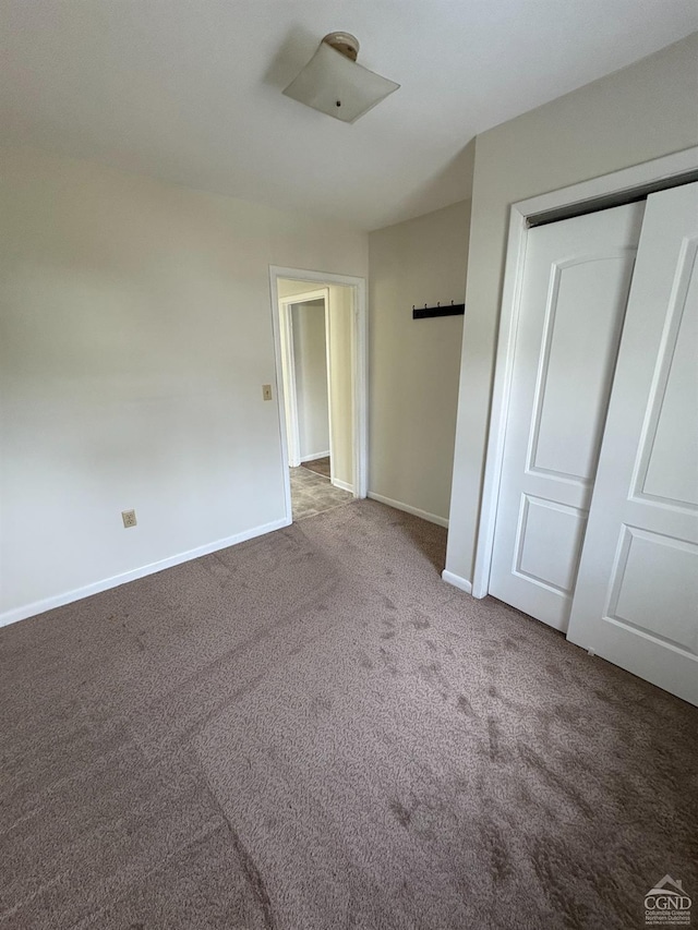 1013 Plank Rd, Averill Park, NY 12018 - unfurnished bedroom with carpet, baseboards, and a closet