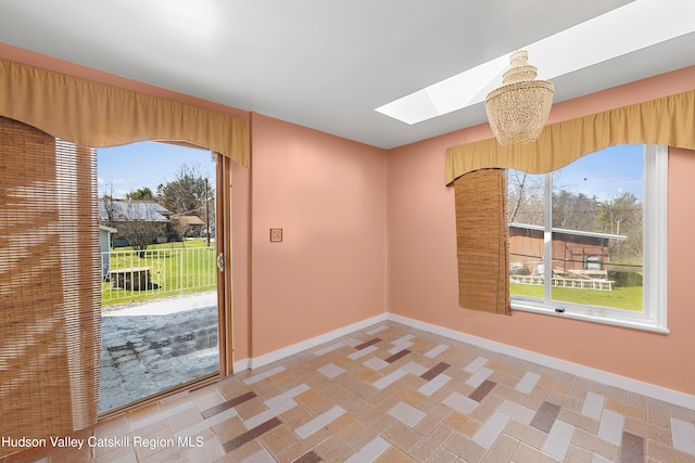 60-62 Stony Rd, Accord, NY 12404 - interior space featuring baseboards, a skylight, and a healthy amount of sunlight