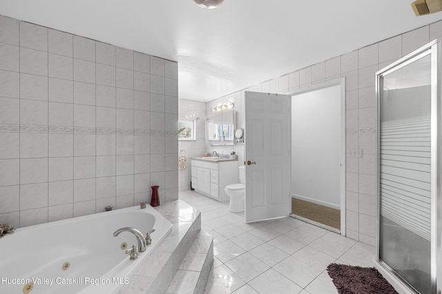 60-62 Stony Rd, Accord, NY 12404 - full bathroom with visible vents, a stall shower, a jetted tub, tile walls, and vanity