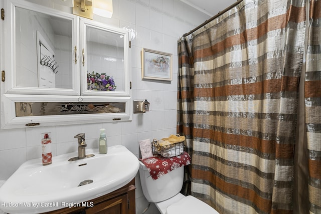 60-62 Stony Rd, Accord, NY 12404 - bathroom featuring decorative backsplash, tile walls, toilet, vanity, and curtained shower